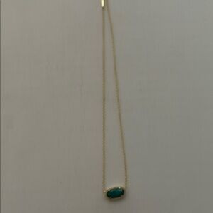 Kendra Scott Elisa gold pendant necklace in emerald cats eye color. Chain 16”.